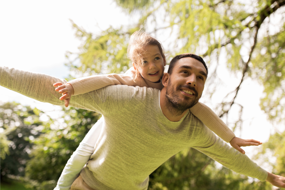 custody-family-lawyer-northern beaches Parent and child in natural light — parenting arrangement advice from Consort Family Law