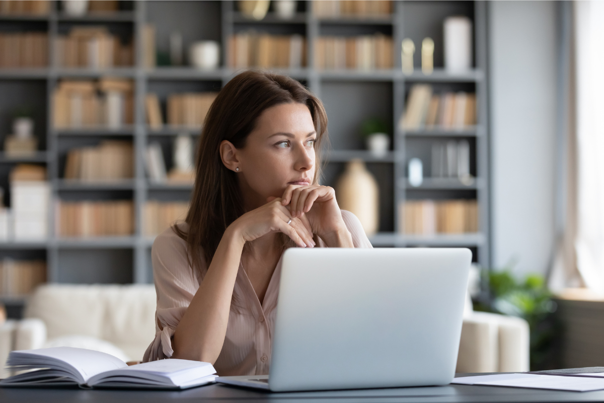 divorce-separation-family-lawyer-northern beaches Woman seated by window, composed — divorce and separation advice from Consort Family Law, North Sydney